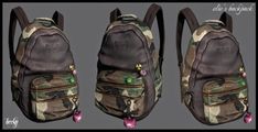 three backpacks with different designs on them, one in camouflage and the other in pink