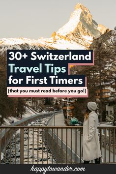 a woman standing on top of a balcony next to a mountain with text overlay reading 30 + switzerland travel tips for first timers that you must read before you go