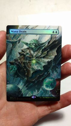 a person holding a card in their hand with the caption manda drain on it