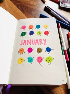 an open notebook with the words january written on it and colorful cartoon characters in different colors