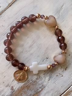 Such a beautiful decade rosary bracelet with rose gold and sparkling crystal! Gold filled Virgin Mary Medal and mother of pearl cross Affordable Spiritual Rosary Bracelet With 8mm Beads, Affordable Handmade Spiritual Rosary Bracelet, Cheap Polished Beads Rosary Bracelet As Gift, Cheap Beaded Rosary Bracelet With Cross, Rosary Bracelet The Catholic Company, Affordable Spiritual Rosary Bracelet, Cheap Rosary Bangle Bracelet As Gift, Cheap Colorful Beads Spiritual Rosary Bracelet, Affordable Personalized Rosary Bracelet Gift