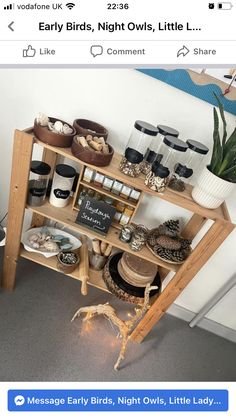 a wooden shelf filled with lots of different items