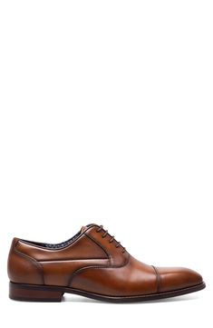 A squared cap toe and polished leather lend modern sophistication to a sleek oxford set on a well-cushioned footbed for optimal support. Removable, cushioned insole with arch support Leather upper/textile lining/rubber sole Imported Formal Brown Oxfords With Removable Insole, Brown Business Oxfords With Removable Insole, Business Brown Oxfords With Removable Insole, Brown Leather Business Shoes With Cushioned Footbed, Cognac Cap Toe Oxfords For Business, Fitted Brown Oxfords With Removable Insole, Brown Formal Leather Shoes With Cushioned Footbed, Formal Brown Leather Shoes With Cushioned Footbed, Business Casual Oxfords With Cap Toe And Removable Insole