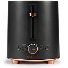 the black and copper toaster is on display