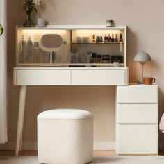 a white vanity and stool in a room