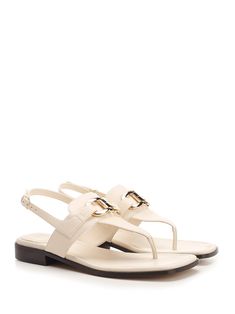 'Lula' thong sandal by Ferragamo, in white leather with double Gancini detail and flat sole. Composition: upper: 100% calf lining: 100% lamb sole: 100% bos taurus. Ferragamo Shoes, Sneaker Wedge, Thong Sandals, Manolo Blahnik, Valentino Garavani, High Heel Shoes, White Leather, Comfortable Shoes, Shoe Laces