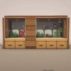 two wooden drawers with plants in them