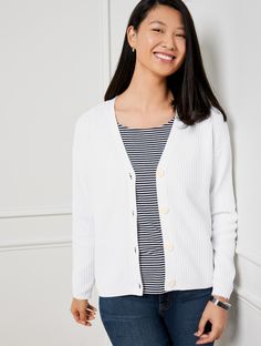 The perfect cozy outer layer. For whatever the day brings. In a cozy cable knit texture with a flattering v-neck. Features Cardigan Long Sleeve Hits At Hip V-Neck Button front closure Straight hem Imported Fit: Misses: 22"; Petite: 21"; Plus: 24 1/2"; Plus Petite: 23" Material: 60% Cotton, 40% Rayon Care: Machine Wash Cold; Only Non-Chlorine Bleach When Needed; Reshape, Lay Flat To Dry; Cool Iron If Needed | Ribbed V-Neck Cardigan Sweater Talbots Cable Knit Cardigan For Everyday Wear, Cardigan Long Sleeve, Modern Classic Style, Knit Texture, Classic Style Women, Cardigan Long, New Pant, V Neck Cardigan, Cardigan Fashion