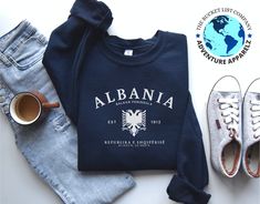 GROUP DISCOUNTS 10% OFF 3-5 Items | Code: GROUP3 15% OFF 6-19 Items | Code: GROUP5 20% OFF 20+ Items | Code: GROUP20 PRODUCT DETAILS & SIZING Albania, a hidden gem in Southeast Europe, boasts a rich cultural history influenced by the Romans, Byzantines, and Ottomans. With its breathtaking beaches along the Adriatic and Ionian seas and rugged mountains, it offers travelers a unique mix of natural beauty and ancient heritage. Our Albania sweatshirt is available in multiple different colors. Made f Etsy Sweatshirts, Albanian Eagle, Rugged Mountains, The Romans, Eagle Shirts, Limassol, Hidden Gem, Albania, Sew-in Labels