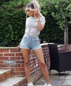 99% COTTON  1% ELASTANE  High Waisted Denim Shorts Distressed Frayed Hem MODEL WEARING SIZE 4 Get the look with our “YSL Top” ♡ High Waisted Denim Shorts Outfit, Singlet Outfit, Ysl Top, Denim Shorts Outfit Summer, Valley Fair, Mom Fits, Denim Shorts Outfit, Women Poses, Bathing Suit Dress