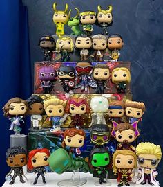 many pop figures are stacked on top of each other