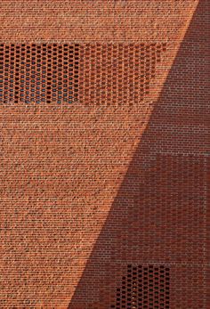 the side of a building that has some bricks on it