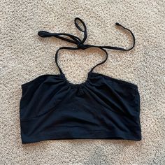 Black Nwot From A Smoke Free Home Offers Welcome! Black Cropped Halter Top For Beach, Casual Black Stretch Halter Top, Black Cotton Halter Top For Summer, Black Crop Halter Top For Spring, Black Crop Top Halter For Spring, Black Halter Crop Top For Spring, Casual Black Cropped Halter Top, Chic Black Cotton Halter Top, Black Crop Top For Spring Workout