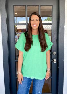 Expertly crafted from a linen blend, The Denison Top boasts cuffed sleeves and a frayed hemline for a chic yet casual look. Stay cool and comfortable in this stylish top, perfect for any occasion. Made with quality materials for long-lasting wear. Chelsea is wearing a size Large. Height is 5’8, Bust is 36”, Waist 28” - 29”, and Hips 42”. Chic Relaxed Fit Top With Frayed Hem, Chic Tops With Frayed Hem And Relaxed Fit, Summer Tops With Frayed Hem In Relaxed Fit, Summer Tops With Frayed Hem And Relaxed Fit, Trendy Tops With Frayed Hem For Day Out, Green Summer Tops For Casual Gatherings, Summer Green Casual Tops, Green Casual Summer Top, Casual Green Summer Top