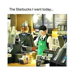 a person standing behind a counter at a restaurant