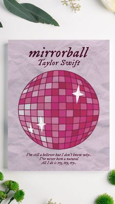 a piece of paper with the words mirrorball taylor swift on it and an image of a disco ball