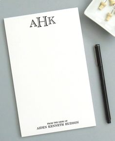 a notepad with the word ahk written on it