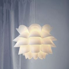 a large white light hanging from the ceiling