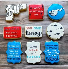 decorated cookies with sayings on them sitting on top of a wooden table next to each other