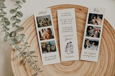 two wedding photo bookmarks sitting on top of a wooden table next to a plant