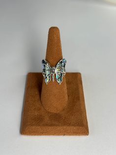 Sterling silver ring inlayed with abalone shell. Wings are smooth and flat. Silver Opal Ring With Inlay For Gift, Butterfly Ring, Abalone Shell, Rings Statement, Sterling Silber, Sterling Silver Ring, Labour Day, Statement Rings, Silver Ring