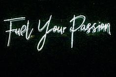 a neon sign that says fuel your passion in white writing on a black background with the words fuel your passion written below it