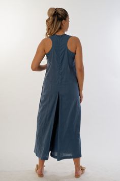 Find the perfect blend of comfort and style with our racing back summer jumpsuit. This model is designed to give you a flawless look and impress with its uniqueness. The jumpsuit is designed with practicality in mind, offering you hidden side pockets where you can store your essential small items. Its calf-length length gives your look an ephemeral lightness and grace. The scoop neckline and cut-out back add an extra dose of sophistication to your outfit. The front panel adds a touch of luxury, Beach Ramie Linen Dress, Unlined A-line Linen Dress, Solid Linen Dress For Vacation, Fitted Linen Lagenlook Dress, Flax Color Ramie Beach Dress, Beach Dress In Flax Ramie, Beach Dress In Flax Color Made Of Ramie, Lagenlook Linen Beach Dress, Beige Sleeveless Cotton Dress