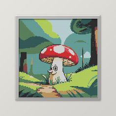 a cross stitch mushroom in the woods