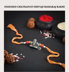 Elegant Traditional Rudraksh Indian Threaded Rakhi bracelet for brother. Exclusive design is available at a very reasonable price. Silver Bracelets With Latkans As Gift, Shivaji Maharaj, Braided Bracelets, Ganesha, Lyon, Exclusive Designs, Jewelry Bracelets, Birthday Gifts, Accessory Gift