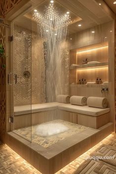 a spa room with a large shower and tub