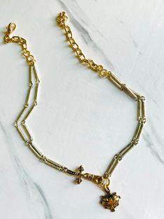 Double strands of textured silver plated bar chain with contrasting brass and gold hardware will light your stack on fire 🔥💛👑 Lobster clasp closure, can be worn at 16” or up to 18”. Free from cadmium, lead, and nickel. Gold Double Strand Jewelry With Lobster Clasp, Gold Double Strand Necklace With Lobster Clasp, Silver Brass Chain Necklace With Delicate Chain, Silver Necklaces With Gold Chain In Brass, Brass Chain Link Necklace With Lobster Clasp, Silver Chain Link Necklace In Brass, Silver Brass Chain Link Necklace, Double Strand Metal Chain Necklace With Lobster Clasp, Metal Chain Necklace With Rectangular Links And Lobster Clasp