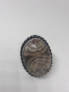 Large brown agate Ornate German Silver Vintage ring, does not tarnish NOT 925 Size 7 can be re sized, my jeweler charges a $10 - $15 fee All rings are shipped free in the US in a nice gift box. Check out our over a THOUSAND great reviews Engraving is $4 per letter and is not always perfect depending on the piece. It can take a few days if the jeweler is busy. This is payable to Paypal Judithsltd@gmail.com Collectible Brown Gemstone Rings, Brown Oval Agate Rings, Oval Brown Agate Rings, Brown Oval Rings With Natural Stones, Oval Brown Rings With Natural Stones, Oval Brown Ring With Natural Stones, Brown Agate, German Silver, Vintage Ring