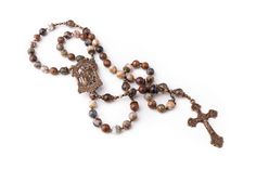 SAVE TODAY WHEN YOU SIGN UP FOR OUR NEWSLETTER Receive updates on upcoming sales, discounts and new products by signing up for newsletter using this link: http://bit.ly/TeamBelieversSave ♦ ITEM DESCRIPTION ♦ During the middle ages, St. Joseph interceded on behave of Sicialians during a terrible drought. In tribute, they wear red on St. Joseph's day. In his honor, this St. Joseph rosary is made of rich brown pietersite with flecks of blue and cream and smokey quartz gemstone beads and is finished Spiritual Brown Rosary For Healing, Brown Crucifix Spiritual Jewelry, Healing Brown Rosary With Round Beads, Spiritual Brown Crucifix Jewelry, Brown Spiritual Crucifix Jewelry, Brown Healing Rosary With Round Beads, Handmade Brown Spiritual Rosary, Handmade Brown Rosary For Healing, Bohemian Brown Rosary With 8mm Beads