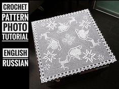 the crochet pattern is shown on top of an old box with white lace