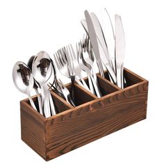 a wooden box filled with silverware and utensils on top of each other