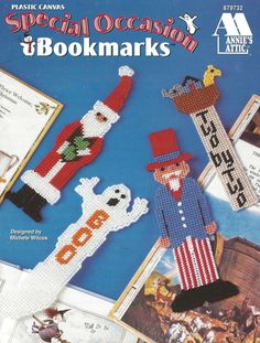 the bookmarks are made from cross - stitch and beaded items, including an image of a man in a top hat