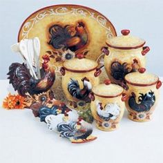 an assortment of ceramic roosters and vases