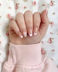 Picture by me #nails #aesthetic #aestheticnails #coquette #coquettenails #pinknails #bownails #ribbonnails #bow #ribbon #pink Coquette Nails Bow, Couqutte Nails Bow, White Nails With Pink Bow, Pink And White Bow Nails, Pink Bows Nails, Nails Acrylic Bow, Baby Pink Nails With Bow, Nail Inspo For Back To School, Coquette Bow Nails