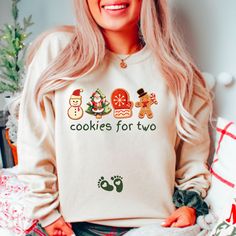 Celebrate the holiday season wearing our funny christmas pregnancy sweatshirt. This shirt is perfect way to break the baby news! This merry and pregnant sweater makes a great gift for a reveal party, daughter or friend who is expecting a new baby and of course yourself! -These sweatshirts are Unisex Adult Sizing (not women's fitted sweatshirt ). If you're going for a more fitted look, we suggest to size down.Please use the measurements chart in the pictures section to determine your correct size. NOTE ABOUT SIZING: These are NOT a maternity style shirt . These sweatshirts  are unisex fit. -Props used In photos  are NOT included with purchase. -Care Instructions: Wash inside out in cold water, gentle cycle, tumble dry low or let air dry. Do not iron on design. If you have any questions, ple Pregnancy Sweatshirt, Cookies For Two, Announcement Photoshoot, Baby Announcement Photoshoot, Measurements Chart, Baby News, Christmas Pregnancy Announcement, Christmas Pregnancy, Baby Pregnancy