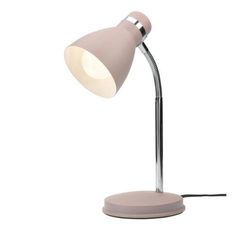 a pink desk lamp on a white background