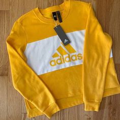 New Nwt Adidas Women's Pg Crew Sweatshirt Large Brand New With Tags Adidas Women's Pullover Crew Sweatshirt. 70% Cotton 30% Polyester. Get Below Msrp! Any Questions Please Message Me. Make Sure You Check Out The Other Items I Have Listed. Trendy Yellow Sweatshirt For Fall, Trendy Yellow Fall Sweatshirt, Casual Yellow Long Sleeve Sweatshirt, Sporty Yellow Long Sleeve Top, Sporty Long Sleeve Yellow Top, Trendy Yellow Cotton Sweatshirt, Yellow Casual Sweatshirt For Spring, Casual Yellow Sweatshirt For Spring, Casual Mustard Sweatshirt For Fall