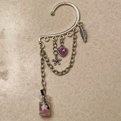 A Beautiful Silver Ear Cuff With Lavender Accents In The Charms. The Resin Charm Was Made By Butterthankllc On Etsy. Handmade By Me, Setrosestudios Silver Bohemian Ear Cuff As Gift, N Keychain, Ear Cuff Diy, Wire Ear Cuffs, Keychain Designs, Lavender Tea, Bead Charms Diy, Silver Ear Cuff, Blue Pendant