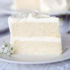 a slice of white cake on a plate