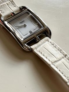 This Cape Cod watch has been purchased in California in 2023 and has been worn just a few times.  Case in impeccable condition. Very slight creases on the leather strap. Sold with original box, receipt, and Hermes Guarantee with the Watch serial number. (Purchased for $4,975) Capes For Women, Cape Cod, The Watch, Accessories Watches, Leather Straps, Wrist Watch, Original Box, Cape, Diamonds