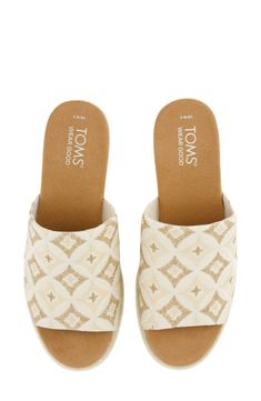 Braided jute adds beachy charm to this geometric-jacquard sandal set on a colorblocked wedge and lightweight sole. 2" wedge OrthoLite® Eco™ X-40 LT Hybrid footbed Textile upper and lining/synthetic sole Imported TOMS gives a minimum of one-third of its annual net profits to support grassroots efforts, partnering with organizations that boost mental health, increase access to opportunity and end gun violence Beige Textile Sandals For Vacation, Beige Textile Sandals For Summer, Summer Beige Textile Sandals, Beige Wedge Sandals With Textured Sole For Vacation, Beige Textured Sole Wedge Sandals For Vacation, Summer Beach Textile Wedge Sandals, Cream Sandals With Branded Insole For Beach, Beach Platform Sandals In Textile, Textile Open Toe Wedge Sandals For Beach