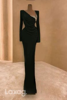 This elegant evening dress features a figure-hugging mermaid silhouette, V-neckline, and long beaded sleeves for an unforgettable look. Crafted from a quality fabric, this dress is perfect for formal events. Black Dinner Dress Long, Long Sleeve Embellished Mermaid Dress For Gala, Elegant Long Sleeve Mermaid Dress For Gala, Formal Dinner Dress, Black Dinner Dress, Beaded Sleeves, Dinner Gowns, Dresses Classy, Satin Evening Dresses