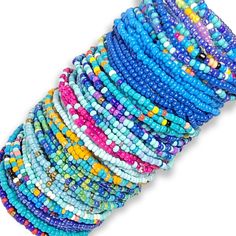 You will receive 10 assorted mixed blue STRETCH STYLE seed bead bracelets. Bracelets will be chosen randomly and may/may not include the pictured selection.  This listing contains bracelets that STRETCH. Blue Heishi Beads Bracelet With Tiny Beads, Blue Beaded Heishi Friendship Bracelets, Blue Bohemian Beaded Bracelets With Tiny Beads, Bohemian Blue Beaded Bracelets With Tiny Beads, Blue Bohemian Beaded Bracelet With Tiny Beads, Blue Friendship Bracelet With Colorful Round Beads, Blue Heishi Beads Hand-strung Bracelets, Blue Heishi Beads Bracelets Hand-strung, Blue Heishi Bead Bracelets With Colorful Beads