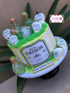 there is a cake that has liquor bottles on it