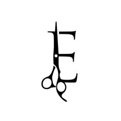 a black and white photo of scissors with the letter e in it's center