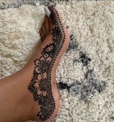 the foot is decorated with an intricate design